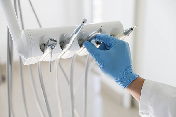 Professional Root Canal Treatment technician working in Umatilla, FL